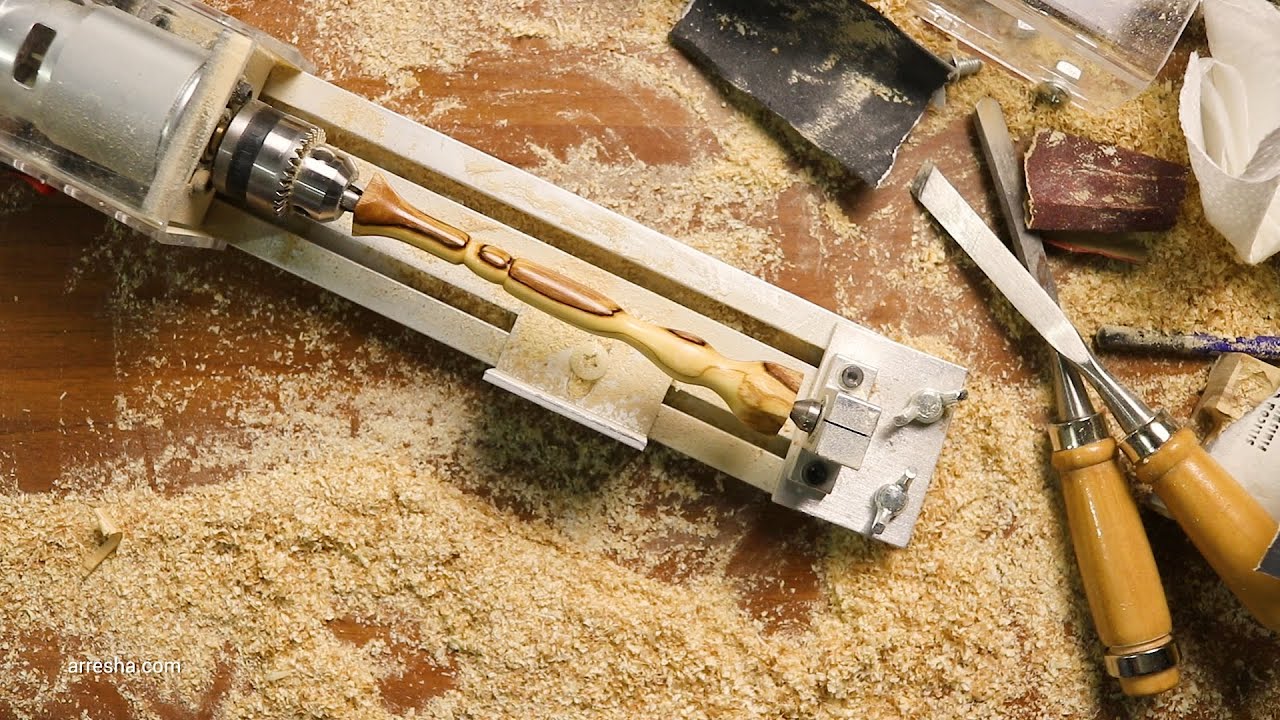 wood turning a pole from olive wood on a mini lathe - beginning wood turning