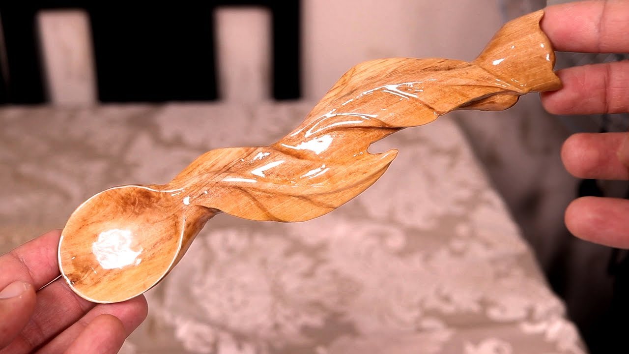 power carving - wood carving a spoon from olive wood.